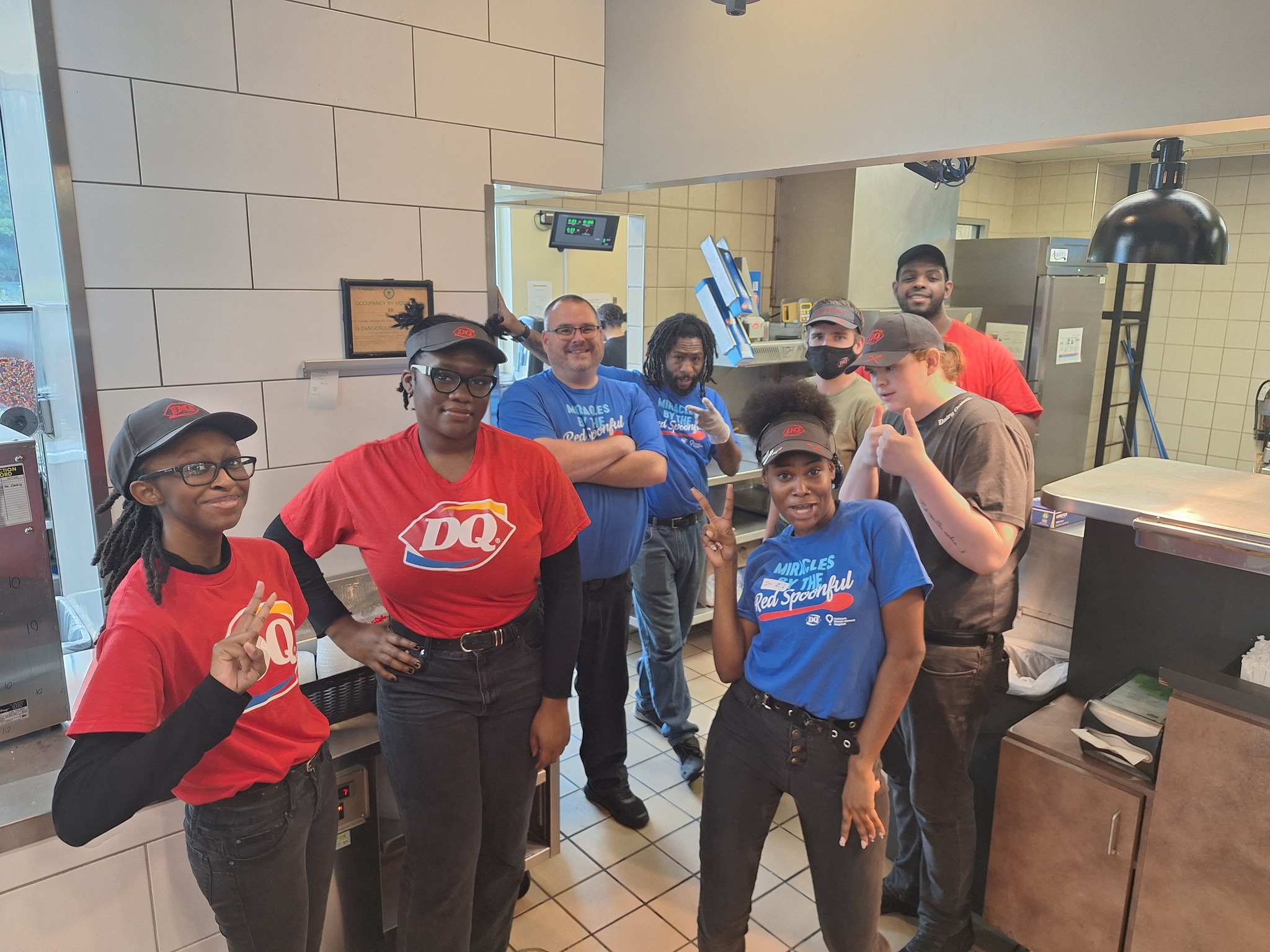 Diverse team of people in the kitchen of the food facility